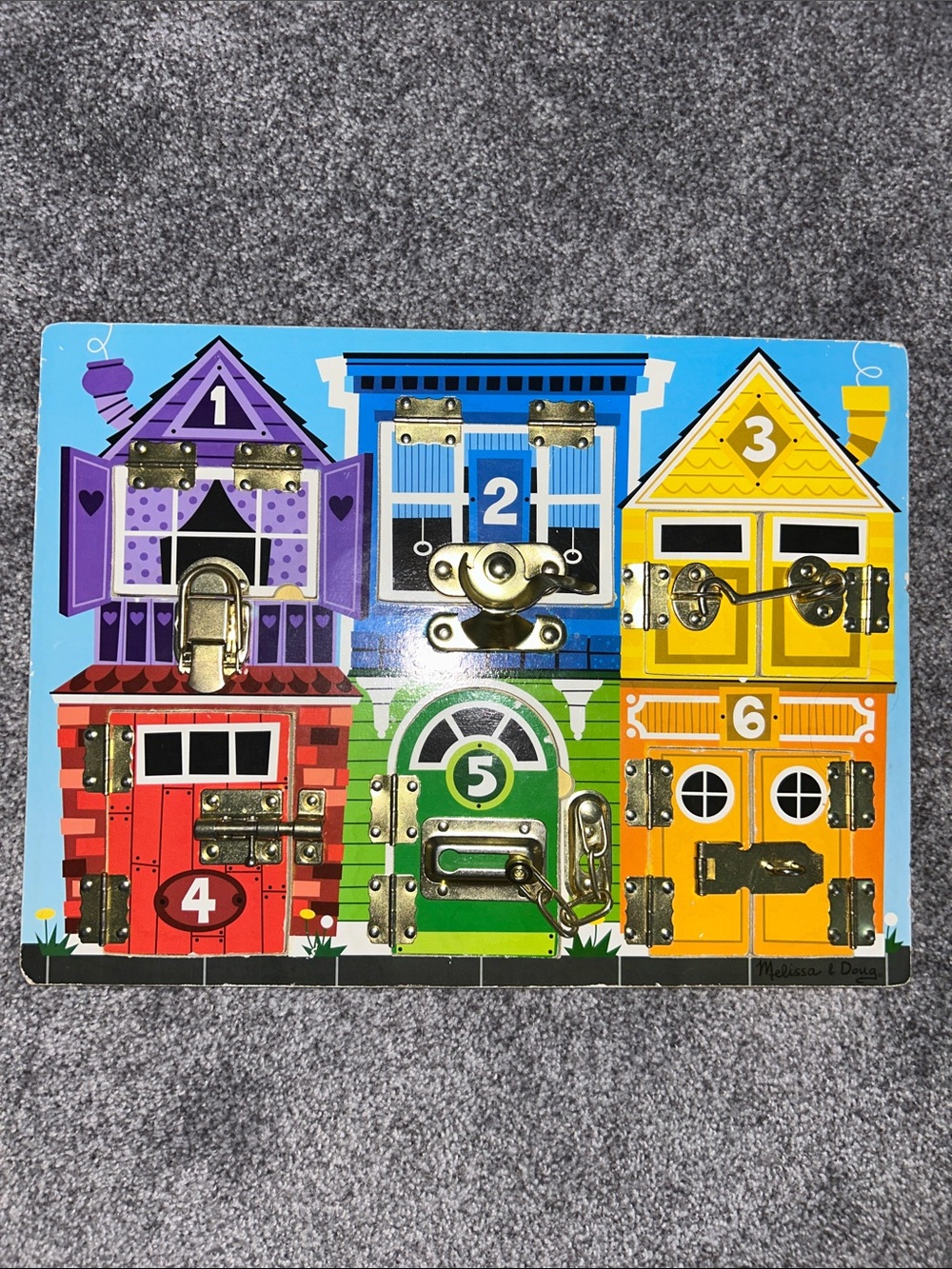 Melissa & Doug Latches Board